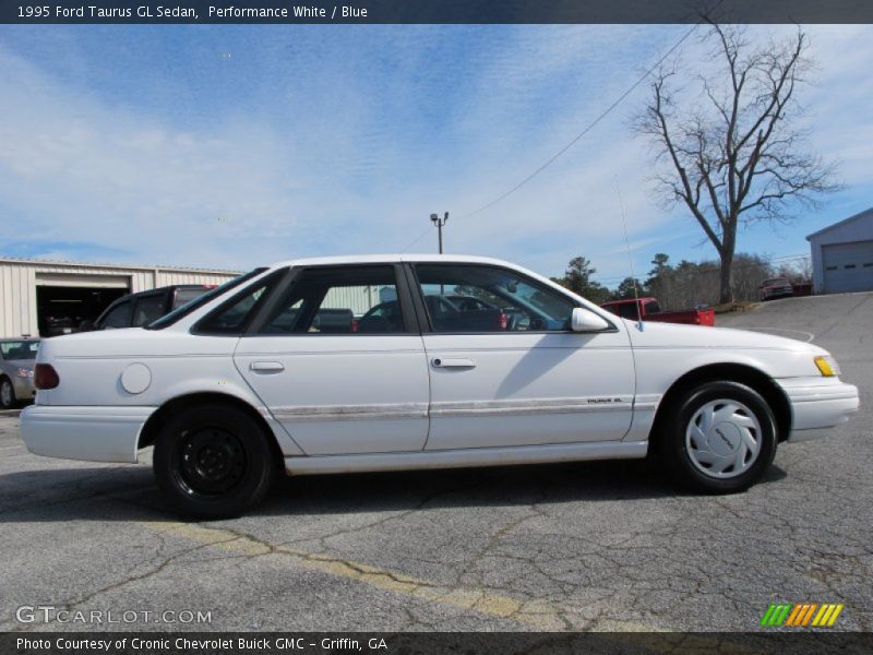 Performance White / Blue 1995 Ford Taurus GL Sedan
