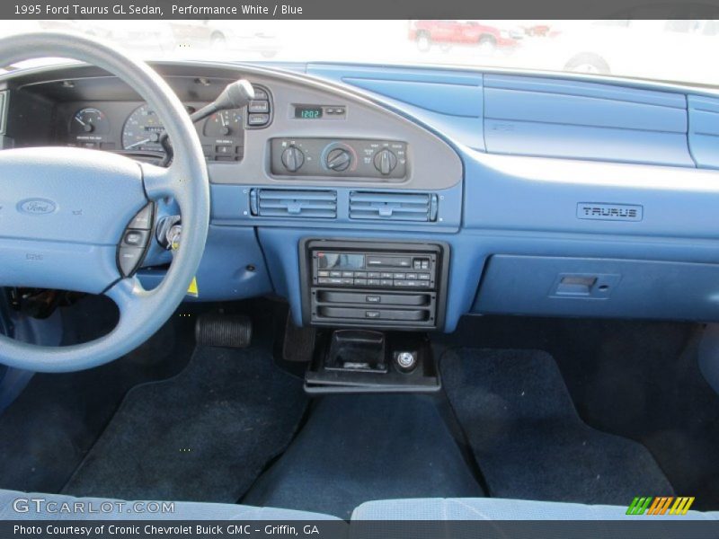 Performance White / Blue 1995 Ford Taurus GL Sedan