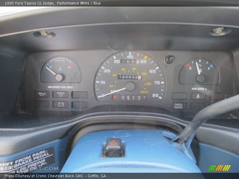 Performance White / Blue 1995 Ford Taurus GL Sedan