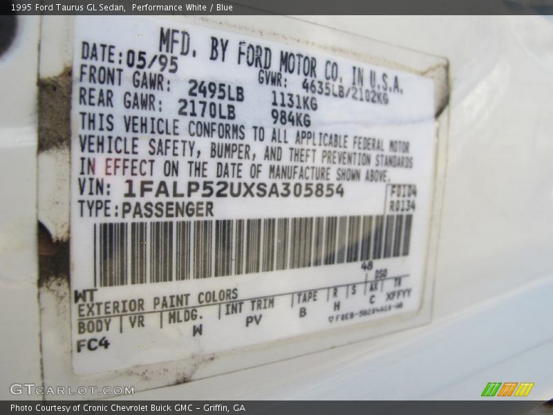 Performance White / Blue 1995 Ford Taurus GL Sedan