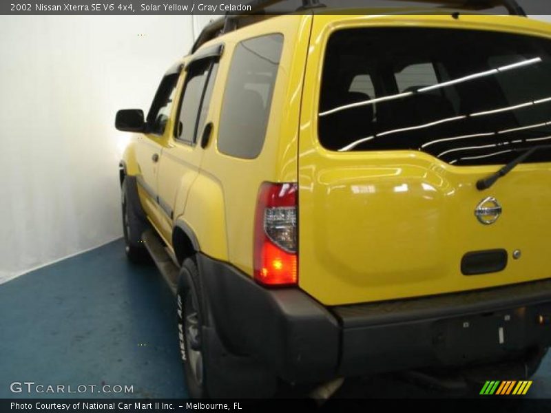 Solar Yellow / Gray Celadon 2002 Nissan Xterra SE V6 4x4