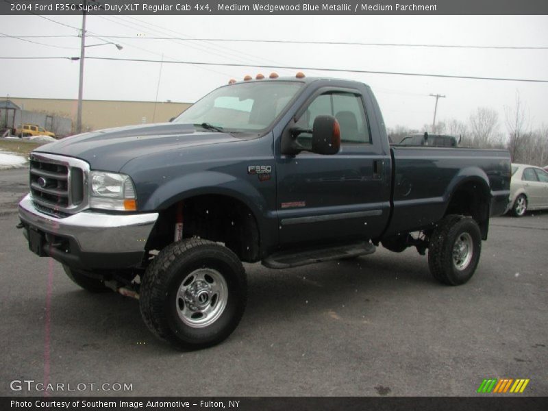 Front 3/4 View of 2004 F350 Super Duty XLT Regular Cab 4x4