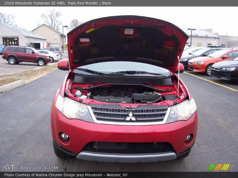 Rally Red Metallic / Black 2009 Mitsubishi Outlander SE 4WD