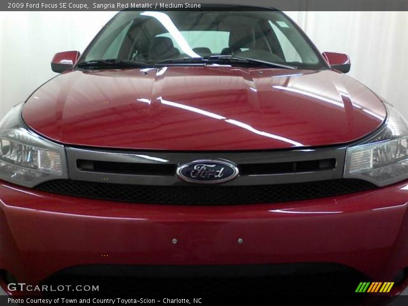 Sangria Red Metallic / Medium Stone 2009 Ford Focus SE Coupe