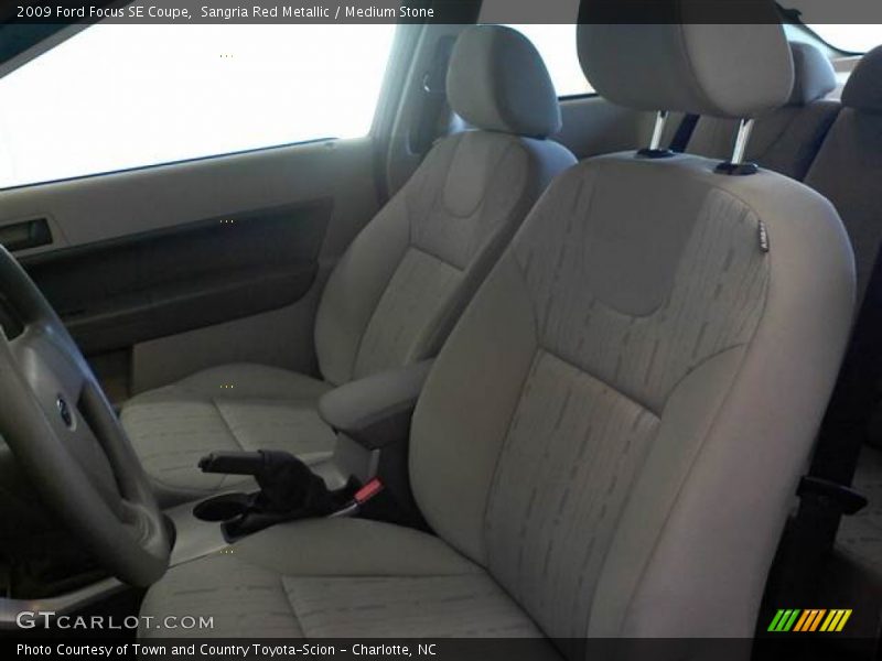 Sangria Red Metallic / Medium Stone 2009 Ford Focus SE Coupe