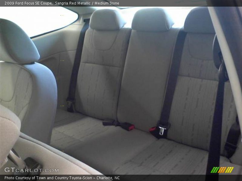 Sangria Red Metallic / Medium Stone 2009 Ford Focus SE Coupe