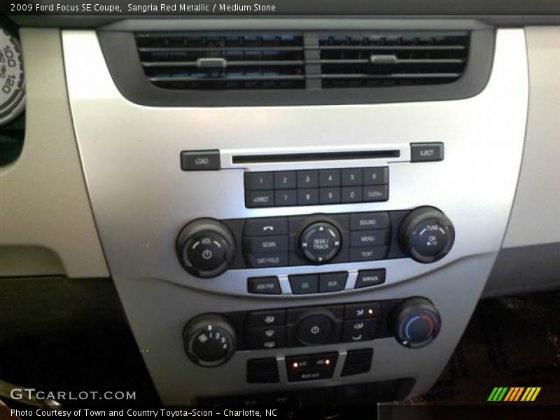 Sangria Red Metallic / Medium Stone 2009 Ford Focus SE Coupe
