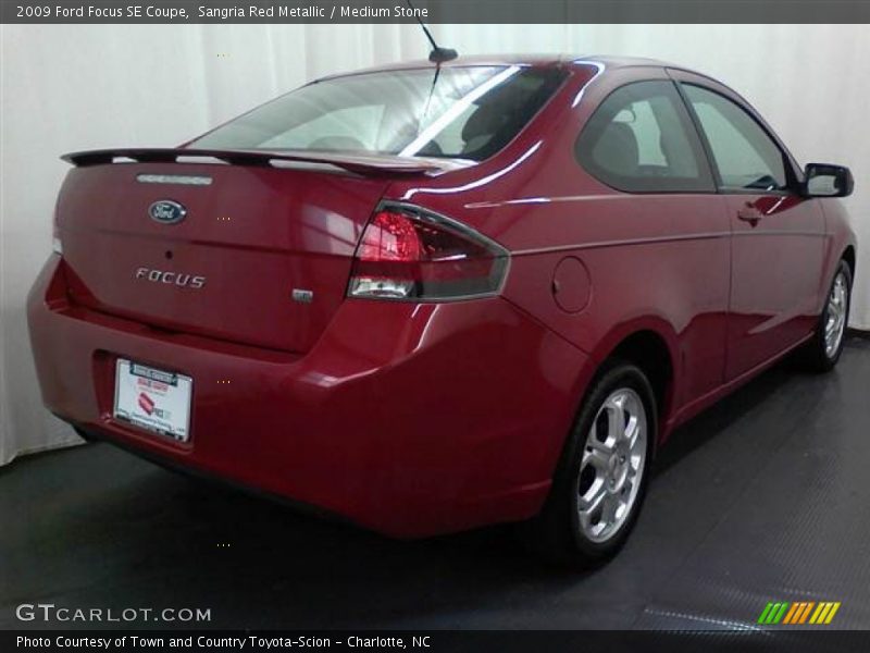 Sangria Red Metallic / Medium Stone 2009 Ford Focus SE Coupe