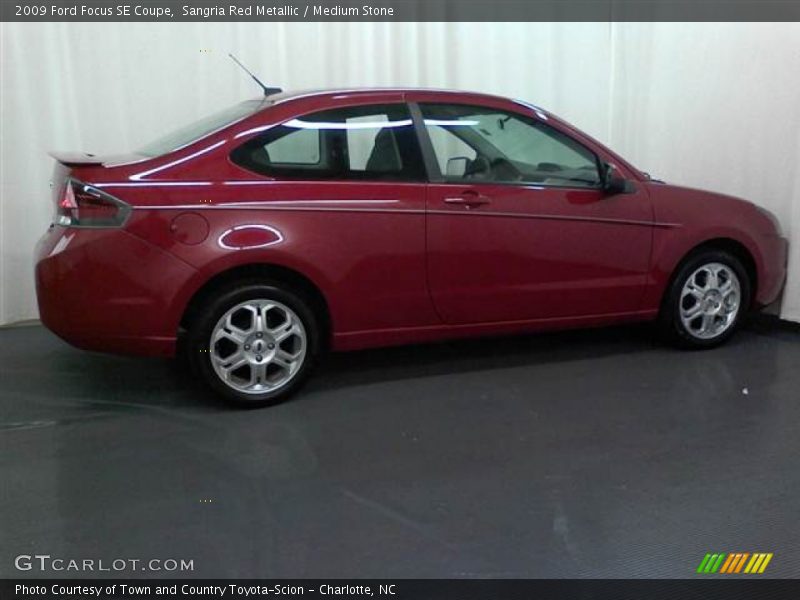 Sangria Red Metallic / Medium Stone 2009 Ford Focus SE Coupe