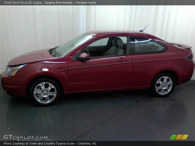 Sangria Red Metallic / Medium Stone 2009 Ford Focus SE Coupe