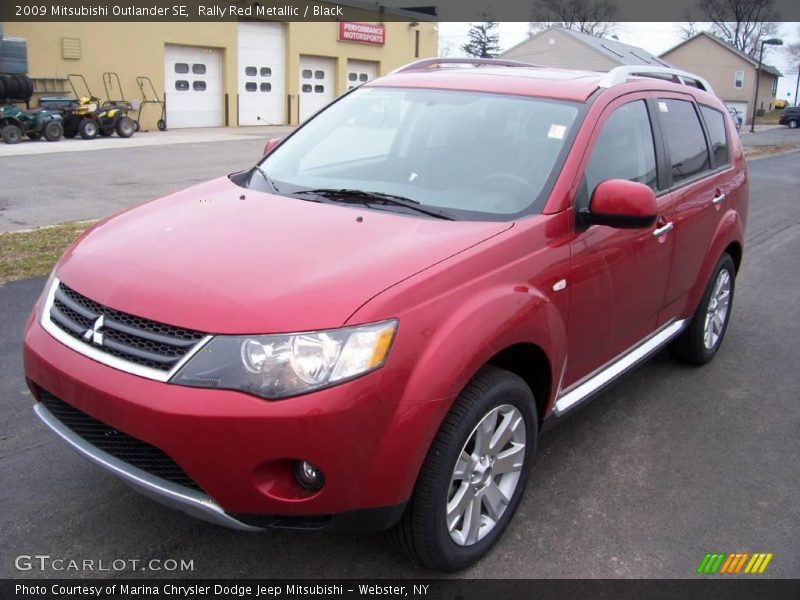 Rally Red Metallic / Black 2009 Mitsubishi Outlander SE