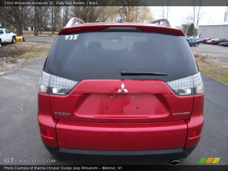 Rally Red Metallic / Black 2009 Mitsubishi Outlander SE
