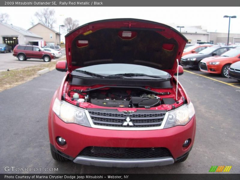 Rally Red Metallic / Black 2009 Mitsubishi Outlander SE