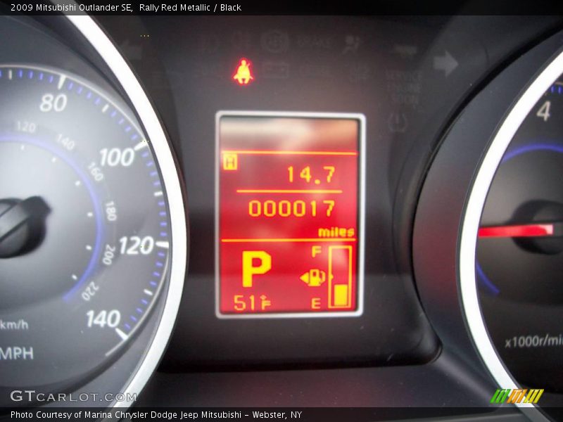 Rally Red Metallic / Black 2009 Mitsubishi Outlander SE