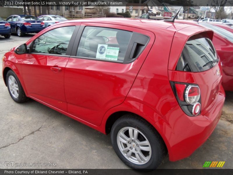 Victory Red / Jet Black/Dark Titanium 2012 Chevrolet Sonic LS Hatch