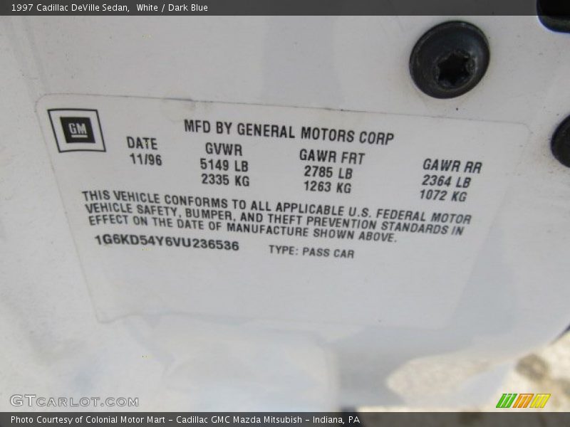 White / Dark Blue 1997 Cadillac DeVille Sedan
