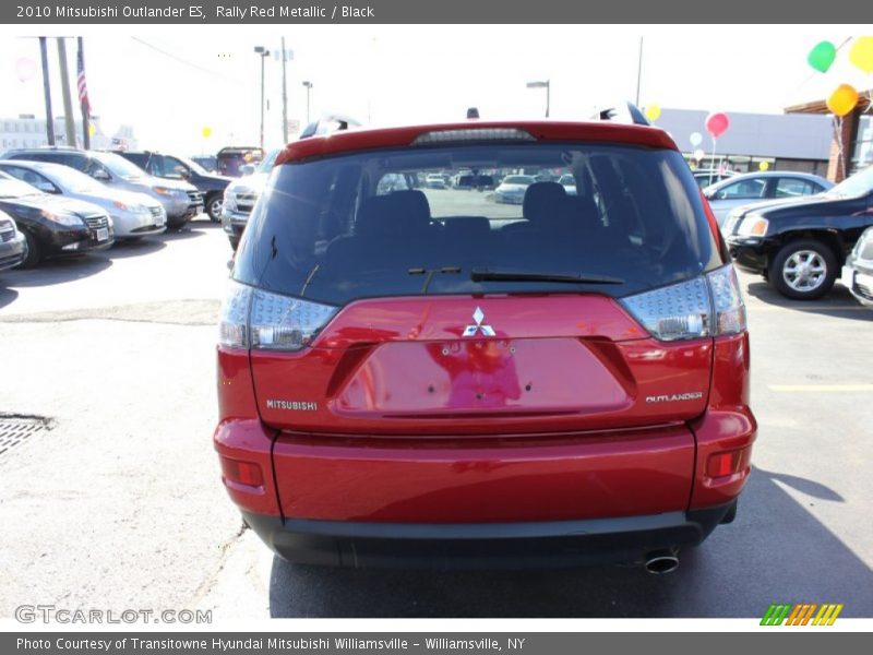 Rally Red Metallic / Black 2010 Mitsubishi Outlander ES