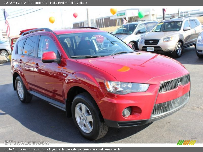 Rally Red Metallic / Black 2010 Mitsubishi Outlander ES