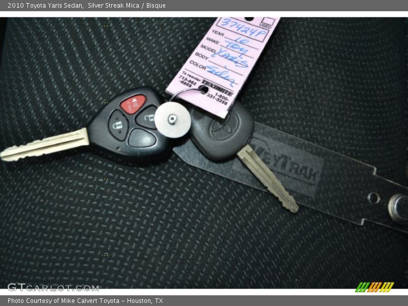 Silver Streak Mica / Bisque 2010 Toyota Yaris Sedan