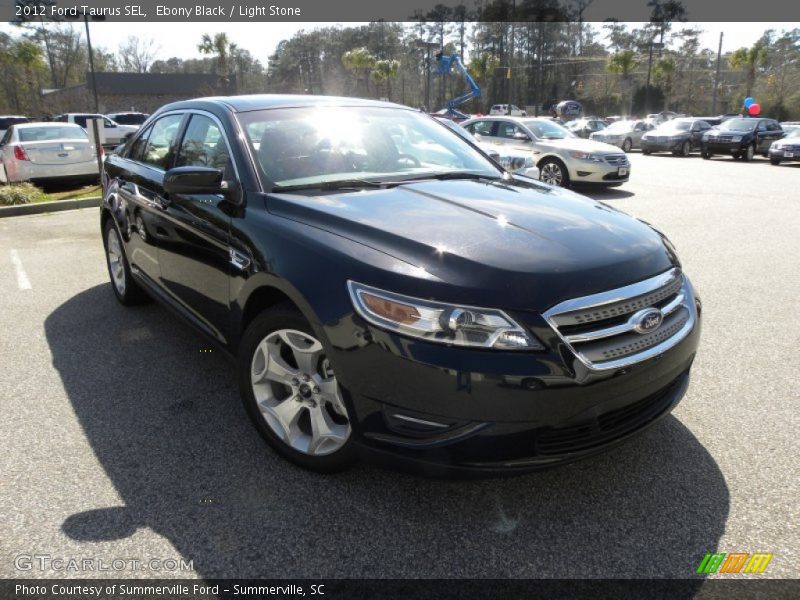 Ebony Black / Light Stone 2012 Ford Taurus SEL
