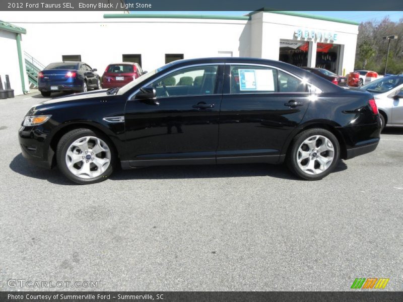 Ebony Black / Light Stone 2012 Ford Taurus SEL