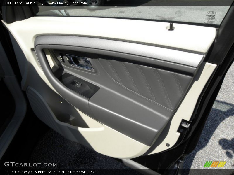 Ebony Black / Light Stone 2012 Ford Taurus SEL