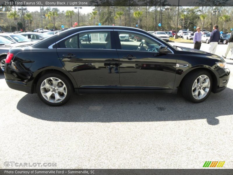 Ebony Black / Light Stone 2012 Ford Taurus SEL