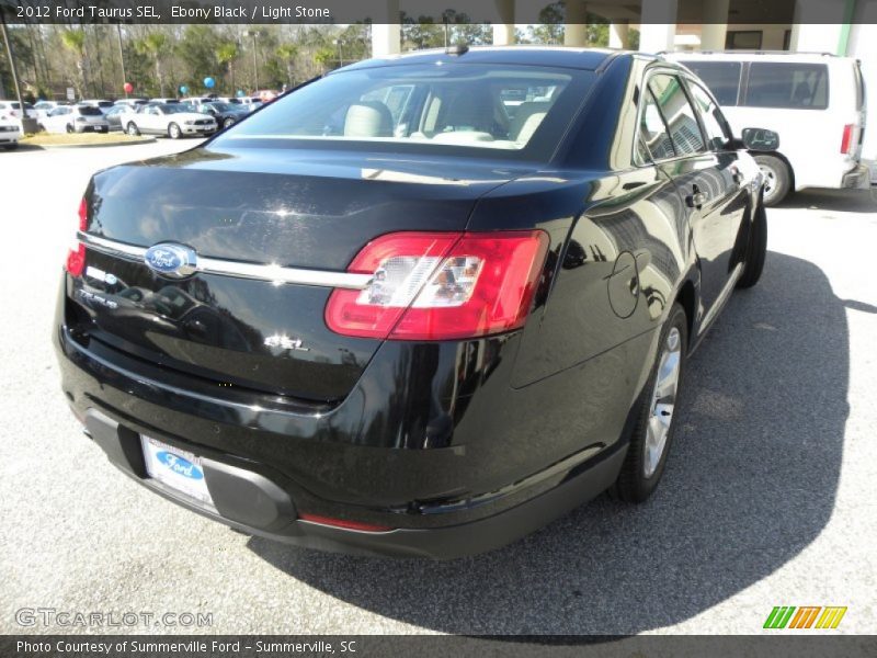 Ebony Black / Light Stone 2012 Ford Taurus SEL