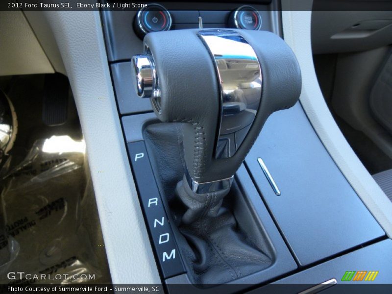 Ebony Black / Light Stone 2012 Ford Taurus SEL