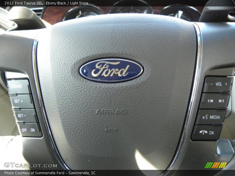 Ebony Black / Light Stone 2012 Ford Taurus SEL