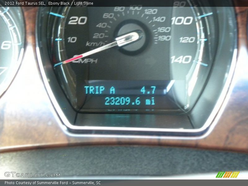 Ebony Black / Light Stone 2012 Ford Taurus SEL