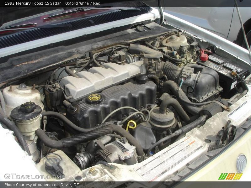 Oxford White / Red 1992 Mercury Topaz GS Sedan