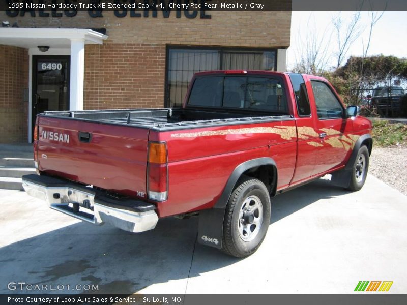 Cherry Red Pearl Metallic / Gray 1995 Nissan Hardbody Truck XE Extended Cab 4x4