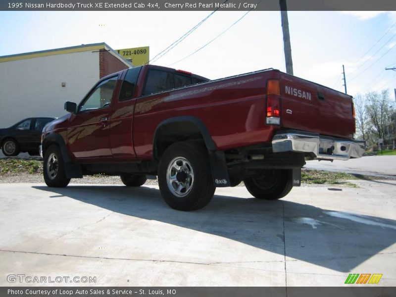 Cherry Red Pearl Metallic / Gray 1995 Nissan Hardbody Truck XE Extended Cab 4x4