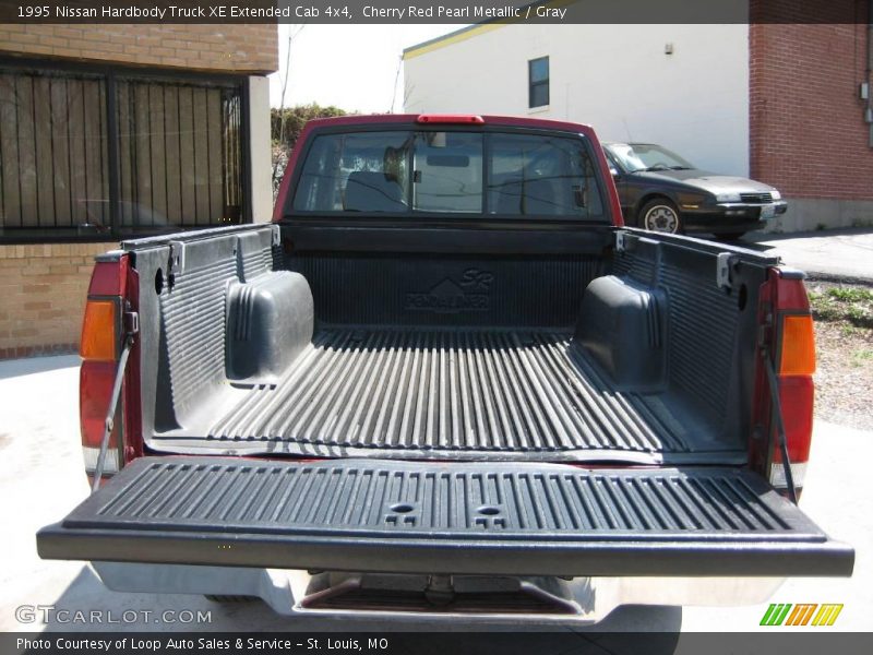 Cherry Red Pearl Metallic / Gray 1995 Nissan Hardbody Truck XE Extended Cab 4x4