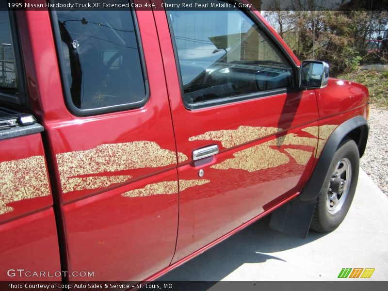 Cherry Red Pearl Metallic / Gray 1995 Nissan Hardbody Truck XE Extended Cab 4x4