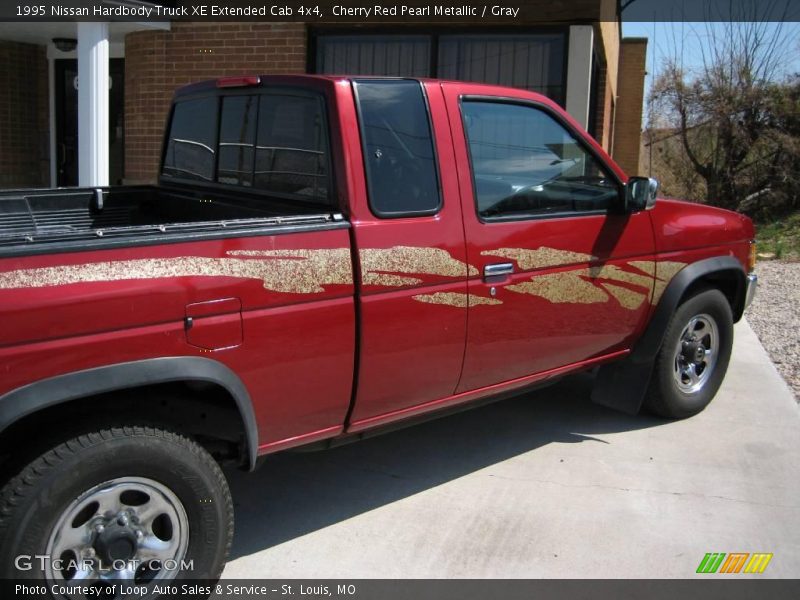 Cherry Red Pearl Metallic / Gray 1995 Nissan Hardbody Truck XE Extended Cab 4x4