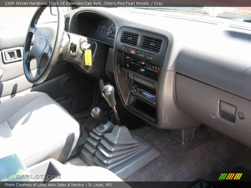 Cherry Red Pearl Metallic / Gray 1995 Nissan Hardbody Truck XE Extended Cab 4x4