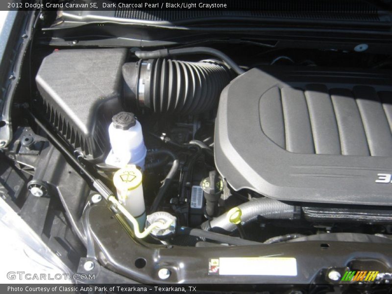 Dark Charcoal Pearl / Black/Light Graystone 2012 Dodge Grand Caravan SE
