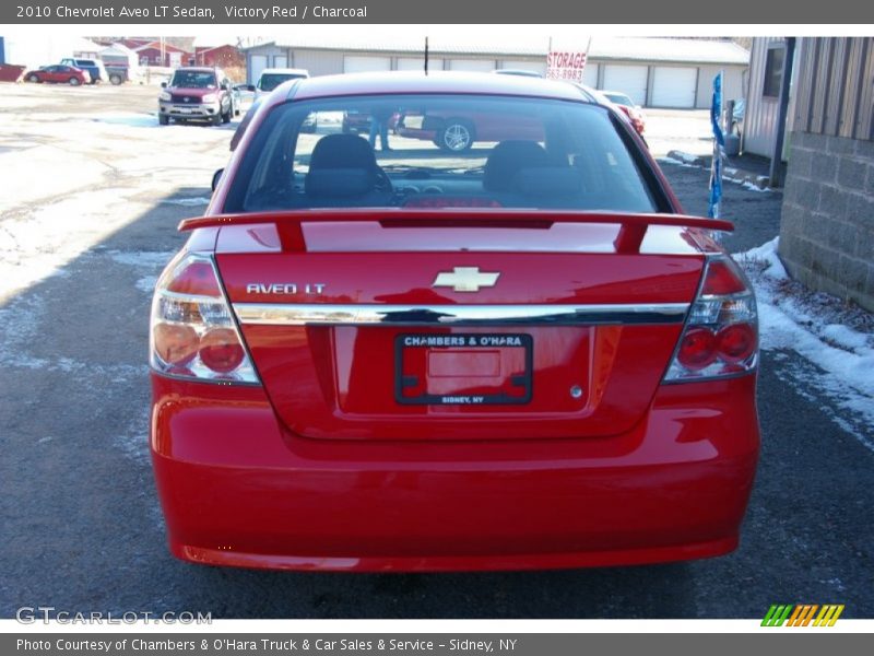 Victory Red / Charcoal 2010 Chevrolet Aveo LT Sedan