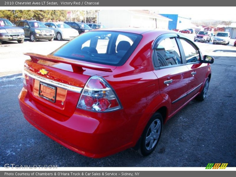 Victory Red / Charcoal 2010 Chevrolet Aveo LT Sedan