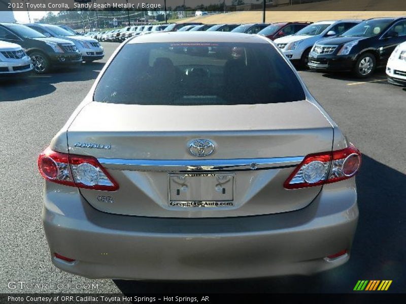 Sandy Beach Metallic / Bisque 2012 Toyota Corolla