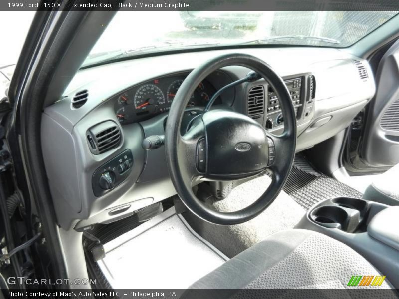 Black / Medium Graphite 1999 Ford F150 XLT Extended Cab