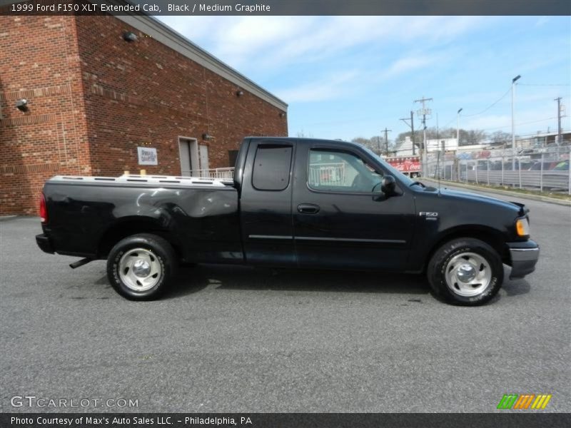 Black / Medium Graphite 1999 Ford F150 XLT Extended Cab