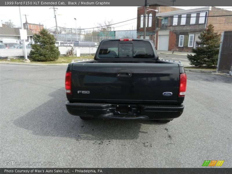 Black / Medium Graphite 1999 Ford F150 XLT Extended Cab