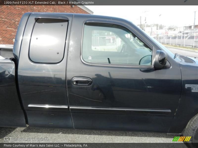 Black / Medium Graphite 1999 Ford F150 XLT Extended Cab
