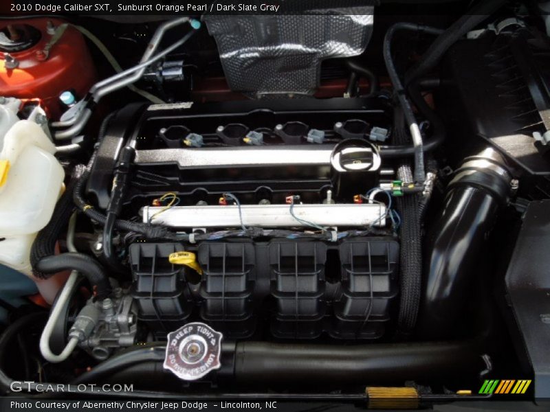 Sunburst Orange Pearl / Dark Slate Gray 2010 Dodge Caliber SXT