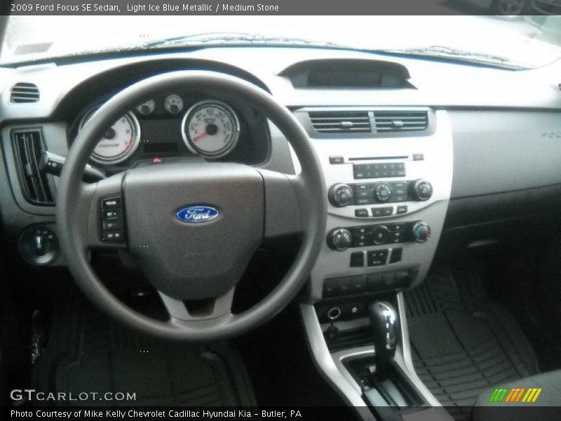 Light Ice Blue Metallic / Medium Stone 2009 Ford Focus SE Sedan