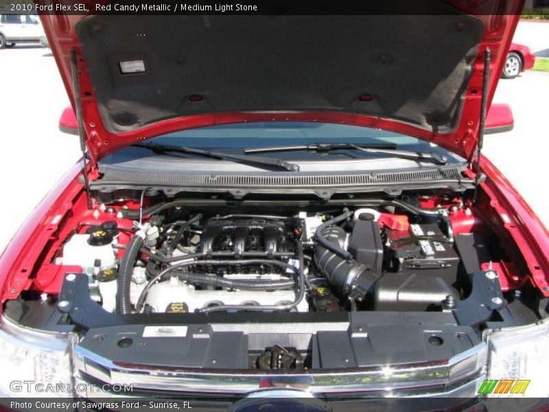 Red Candy Metallic / Medium Light Stone 2010 Ford Flex SEL