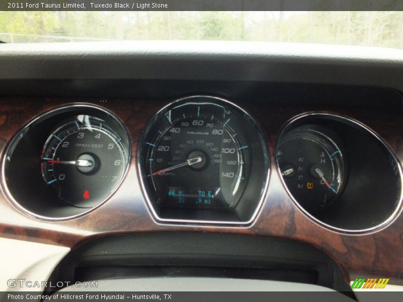 Tuxedo Black / Light Stone 2011 Ford Taurus Limited